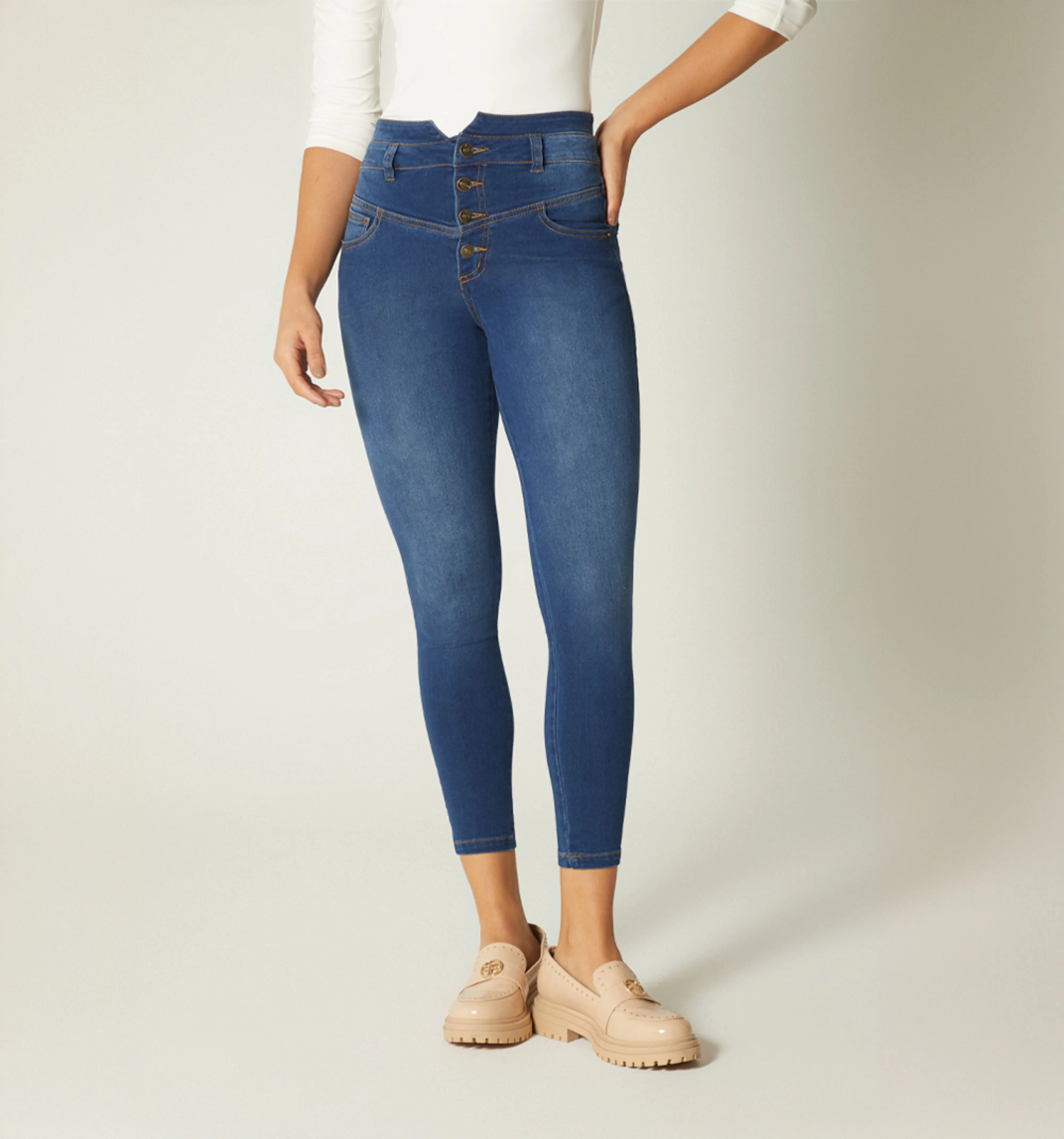 Jean skinny tiro alto con botones