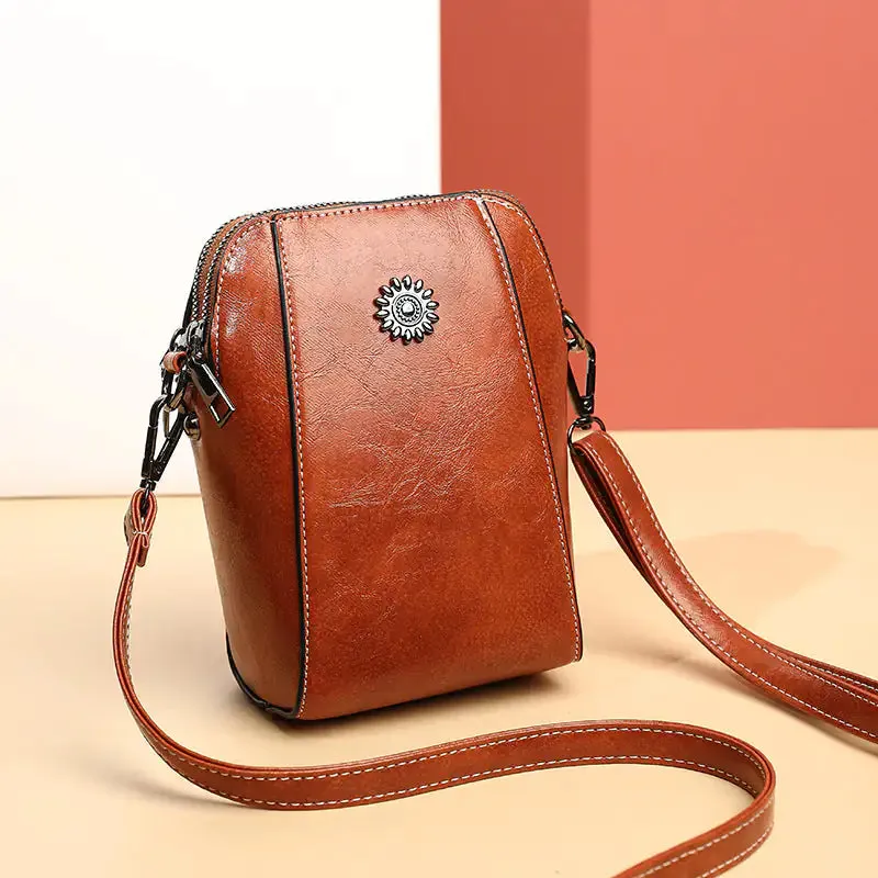 Mini bolso estilo bandolera de piel