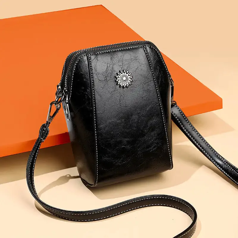 Mini bolso estilo bandolera de piel
